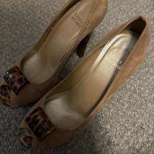 Stuart Weitzman Beige Suede Peep Toe Pumps with Leopard Print Heel and Ornament